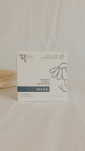 Rhoeco - NATURE'S REMEDY COLLECTION RELAX, PURELA, luonnollinen rentoutusvalmiste, purkki ja tuotesarjan pakkaus näkyvissä