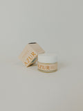 PURELA AZUR Balm Beauté 60g voide, luonnollinen huulivoide ja kasvojen kosteutin, näkyy purkki ja tuote kuvassa