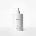 Käsivoide ja vartalovoide PURELA: NUORI Enriched Hand & Body Lotion 500 ml, harmaa purkki, pehmeä koostumus.